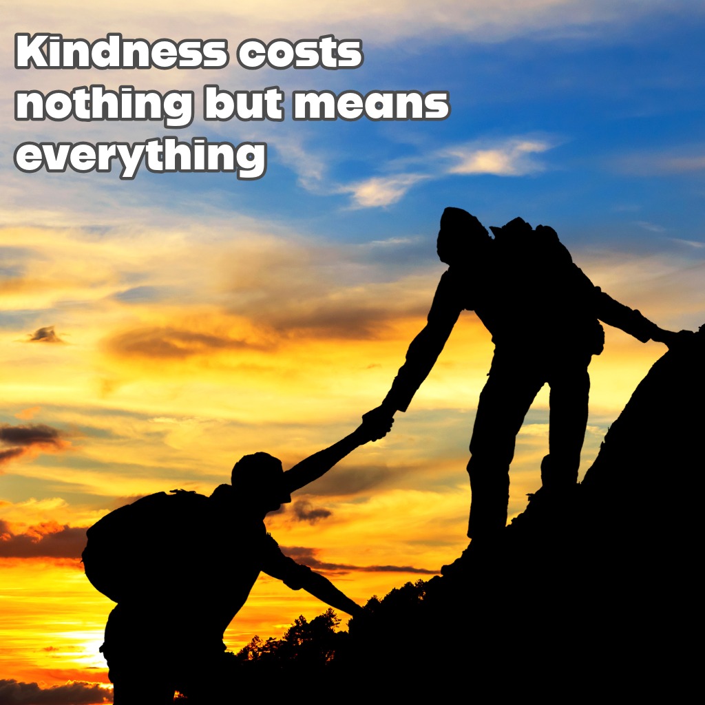Two hands helping someone stand up